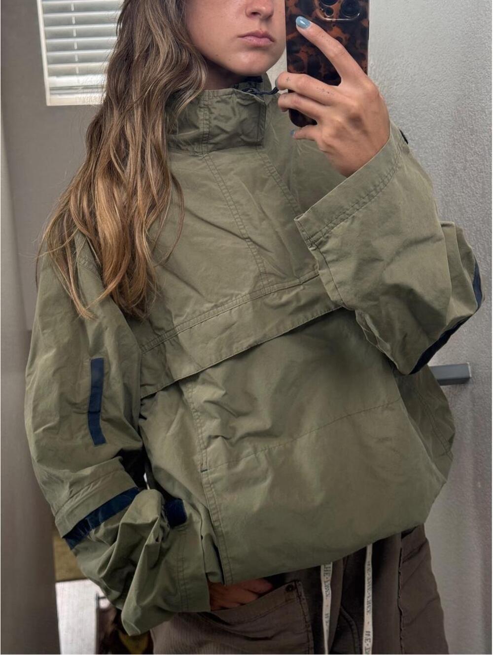 Olive green funnel neck jacket with navy blue stripes on sleeves #windbreaker